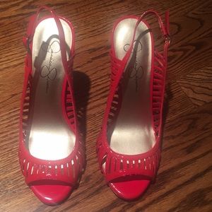 Jessica Simpson. Red heels. 7.5